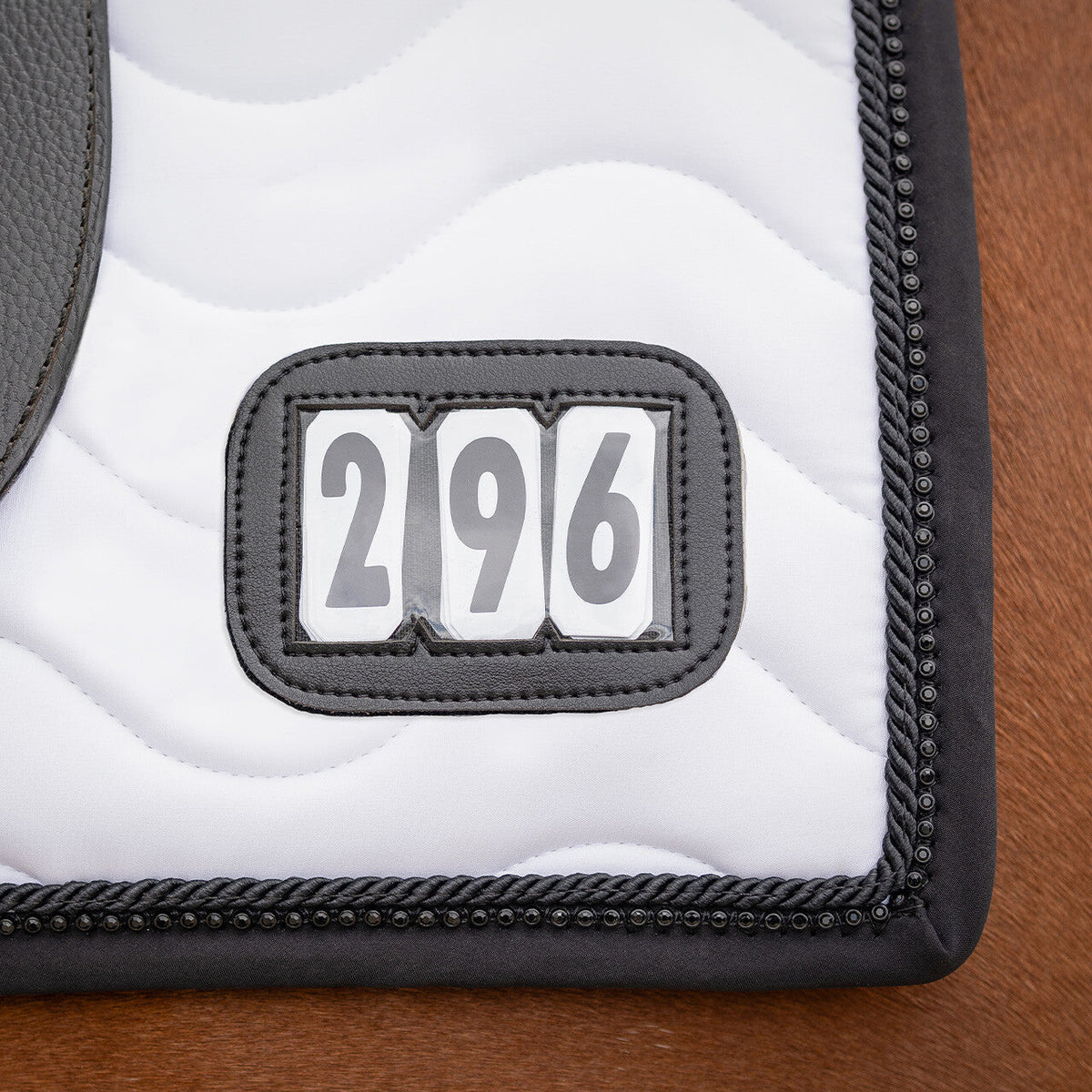 Saddle pad Number